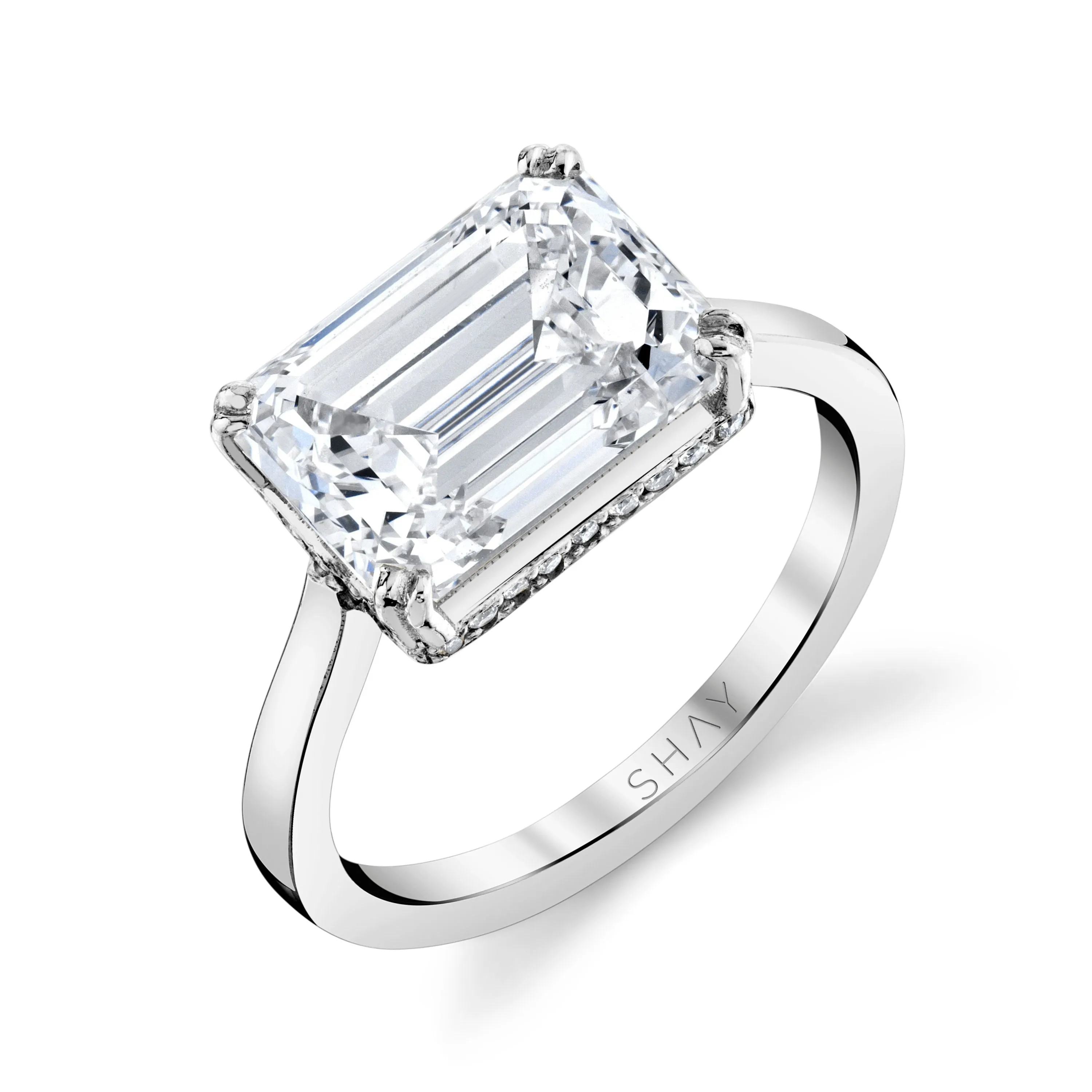 DIAMOND HIDDEN HALO EMERALD CUT EAST/WEST RING