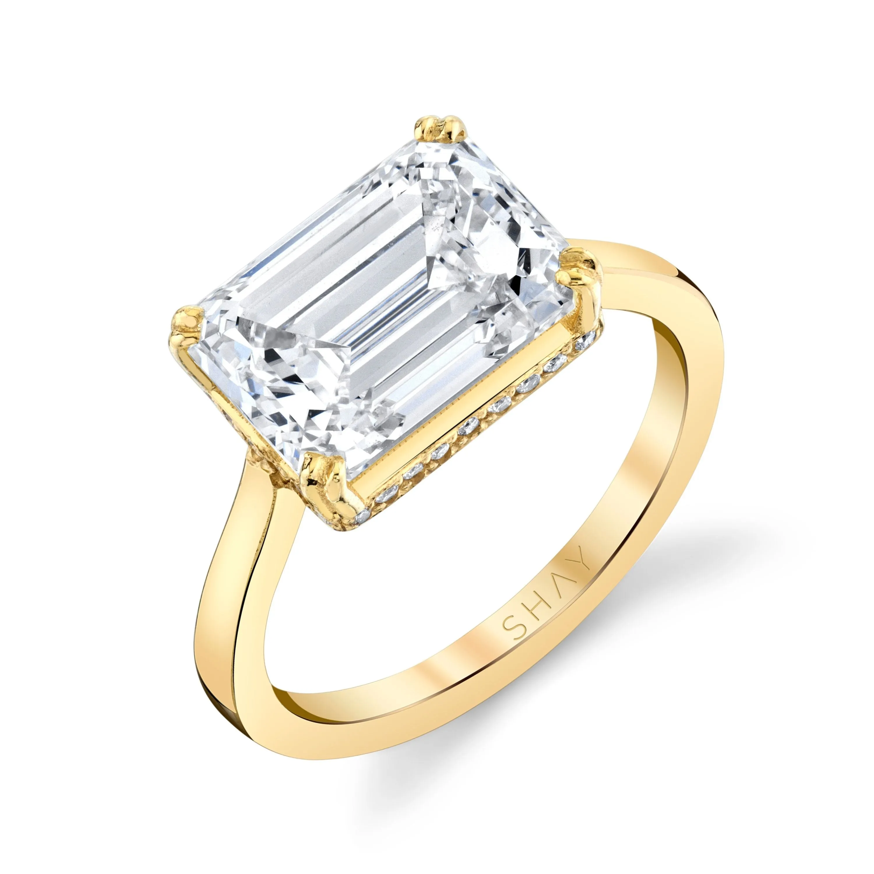 DIAMOND HIDDEN HALO EMERALD CUT EAST/WEST RING