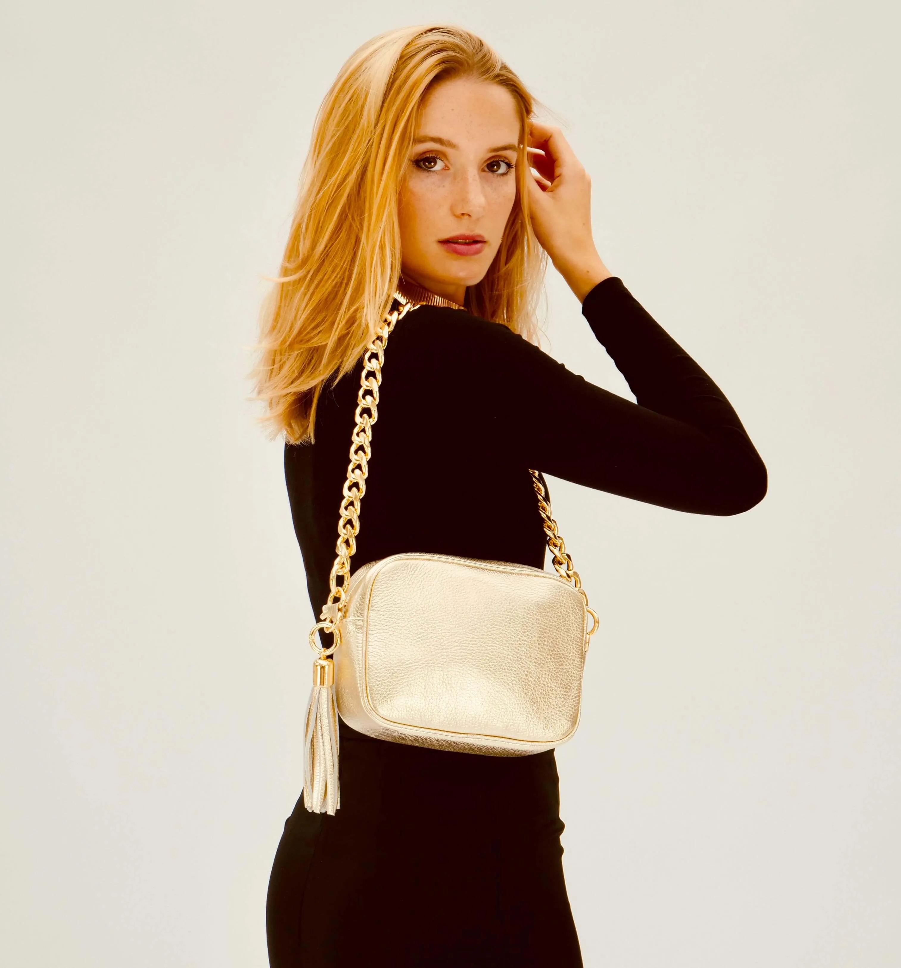 The Tassel Gold Leather Crossbody Bag With Gold Chain Strap